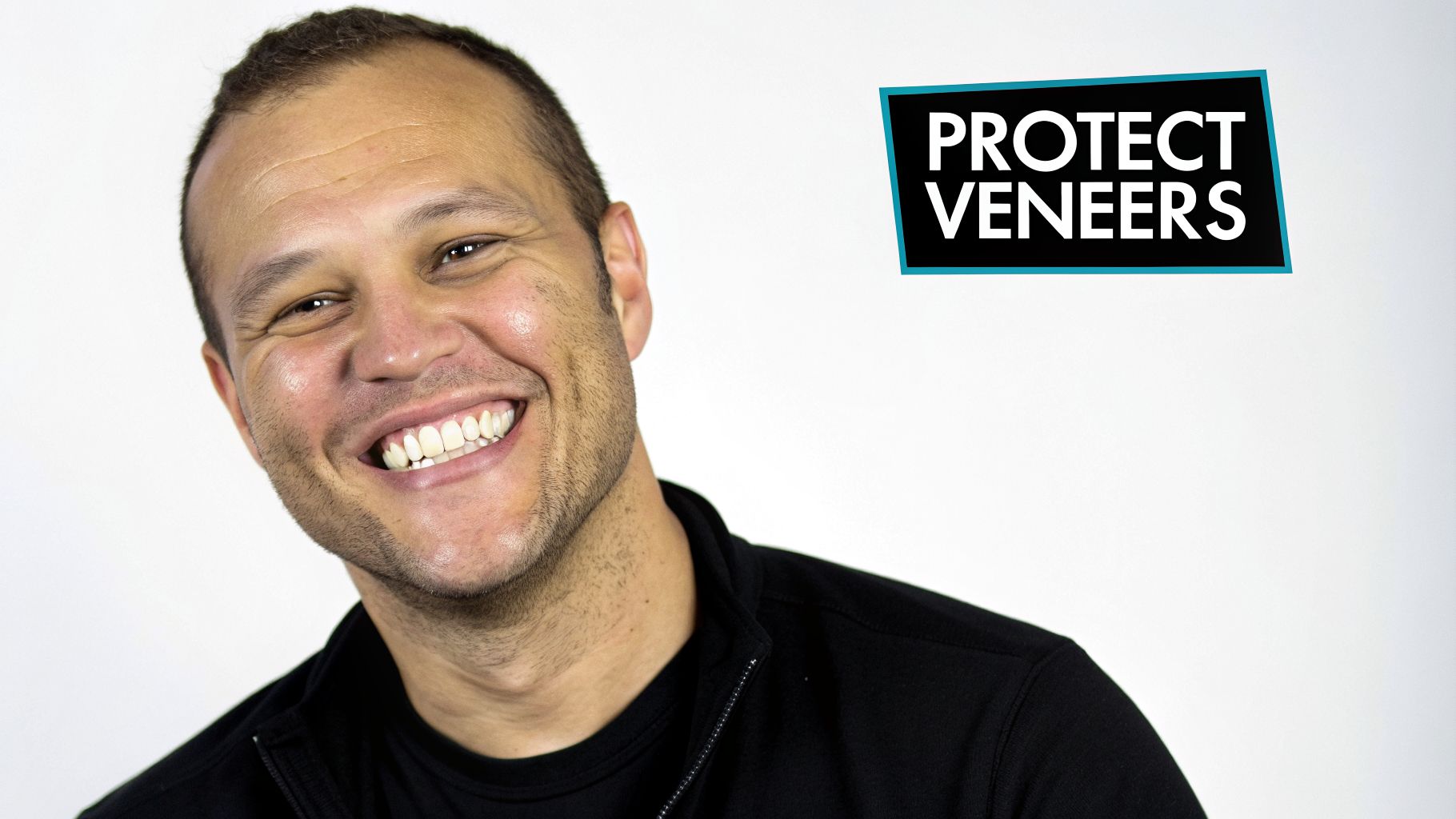 A happy man smiling and showing his bright white teeth, with a graphic stating 'Protect Veneers'.