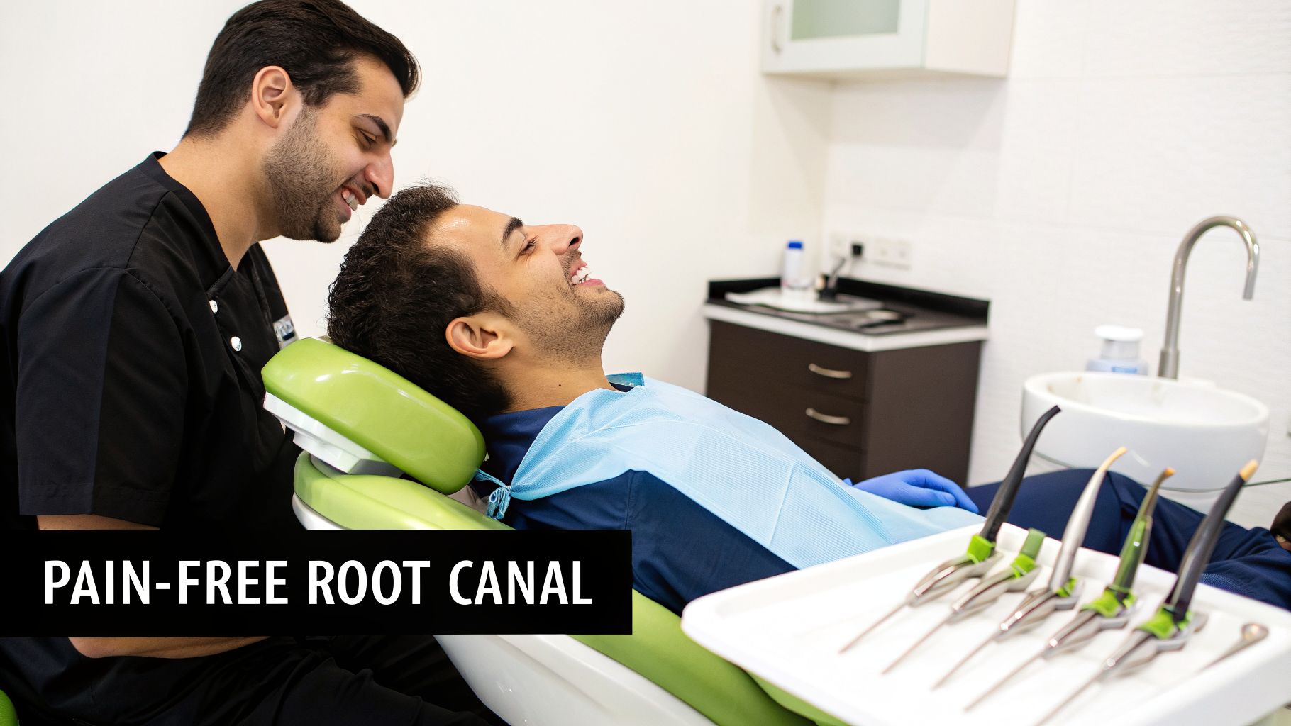 A smiling male dentist talks to a happy patient reclining in a dental chair, hinting at a pain-free root canal.